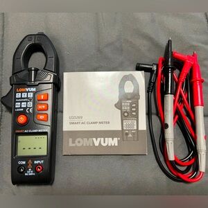 LOMVUM clamp multimeter, in perfect, condition with accessory, very limited use.